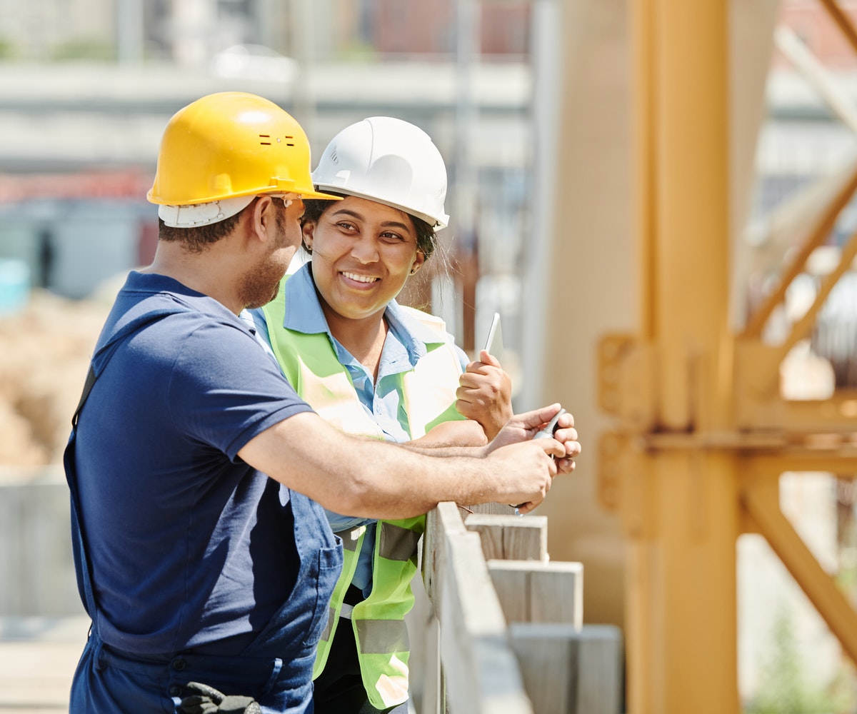 Onsite workers discussing the infrastructure of healthcare facilities